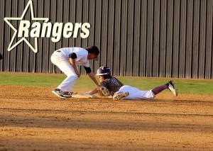 Senior Mason Minister tags a Bourne player out on Feb. 19 during the home game.