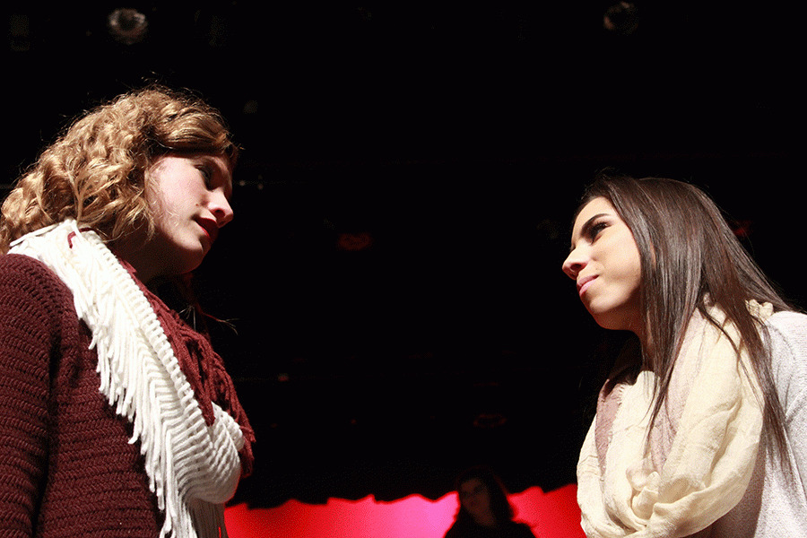 Seniors Lauren Marshall and Bella Medina look at each other intensely while rehearsing for the one act play on Jan. 28.