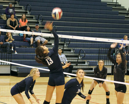 Volleyball spikes to secure  points