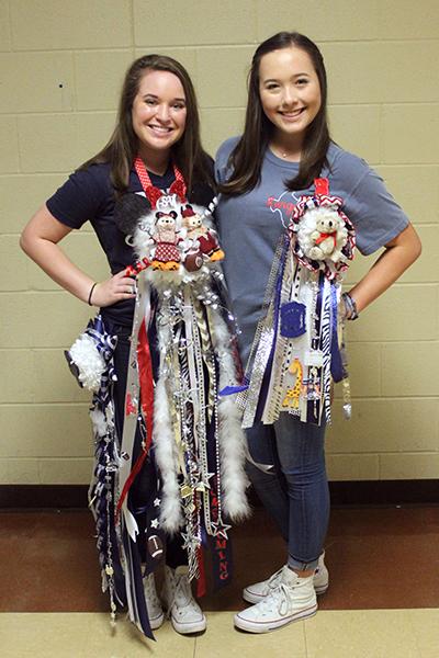 Sophomore dancers Kathleen Bratton and Sydney Rostedt show off their homecoming swag.