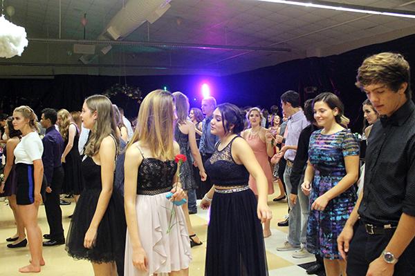 Dancers shake it up on the dance floor during the homecoming dance.