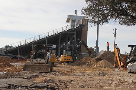 Constructions workers building new stadium entrance
