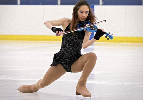 Georgeanna Hoey incorporates two of her loves - figure skating and violin - into a performance. 