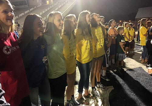 Students rejoice during Fields of Faith in 2016.