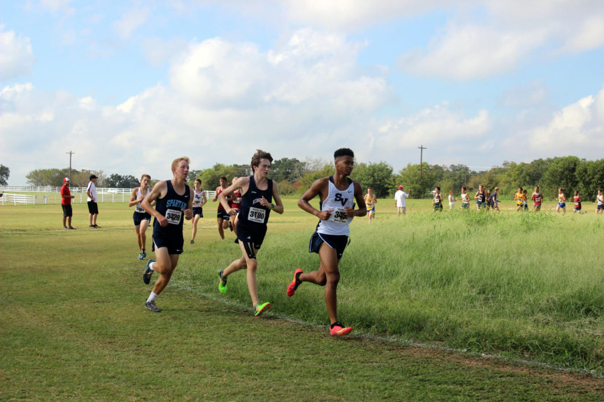 Junior Desmond Henderson makes final lap to approach the finish line.