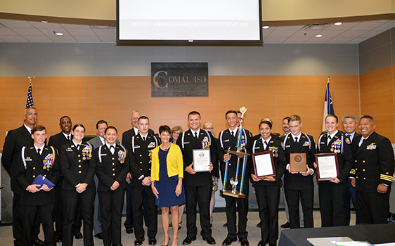 The navy ROTC unit received a flag from state senator Donna Campbell at the school board meeting with Superintendent Andrew Kim and the Comalisd Board of Trustees. Picture with them are instructors Commander
Vincent Quidachay, Chief Daniel Hansen, and Senior Chief Chris Simmons and
student cadet officers Logan Marraro, Alyssa Thomas, Lynnea Seiler, Lachlan
Shipp, Seth Davidson, Asia Sanders, Jonathan Owen, Hannah Randle and Cody
Gayre.