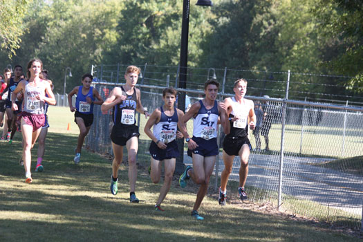 Clayton Wilkerson and Andres Engle lead the pack at the Chili Pepper Festival race on Sept. 30. The boys varsity came out in first place out of all teams in the race.