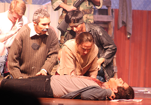 Josiah Webb as Sampson, LJ Haider as Lord Capulet, Alan Solis as Petruchio and Victoria Walton as Lady Capulet weep over the dead Tybalt played by Elf Synodinos.