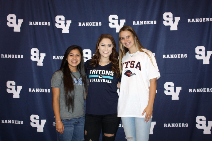 Seniors Gabi Sandoval (Left), Lauren Kadilis (Middle), and Maddie McKay (Right) sign commitments for volleyball.
