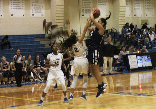 Sophomore Tanyse Moehrig-Woodard takes a contested jump shot in the teams 48-31 loss on the road against Clemens. The team has recently gone on a two game winning streak defeating New Braunfels and East Central.