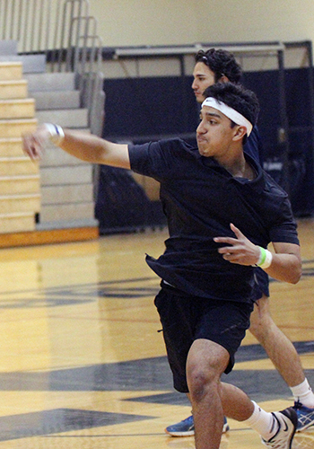 During the dodgeball tournament Thursday, senior Bobby Palomin hurls a ball at the opposing team. The Dodger Federer squad repeated as dodgeball champions.