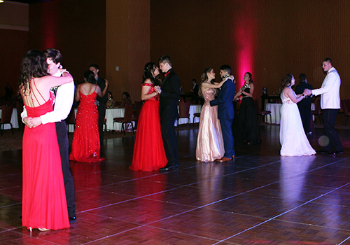 Students enjoy the first slow dance of the night at prom on May 12