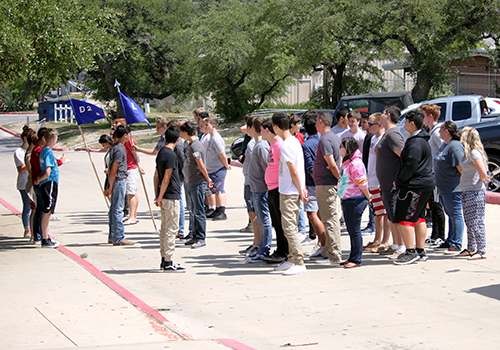 The ROTC cadets of Delta 2 and 3 take role call outside in seventh period on May 22