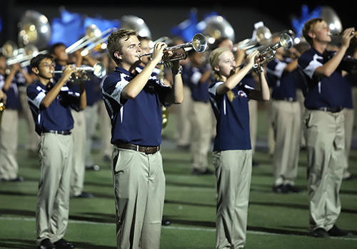 During a halftime performance. sophomore Matthew Middlebrooks and the rest of the band present Xperiment 78070.