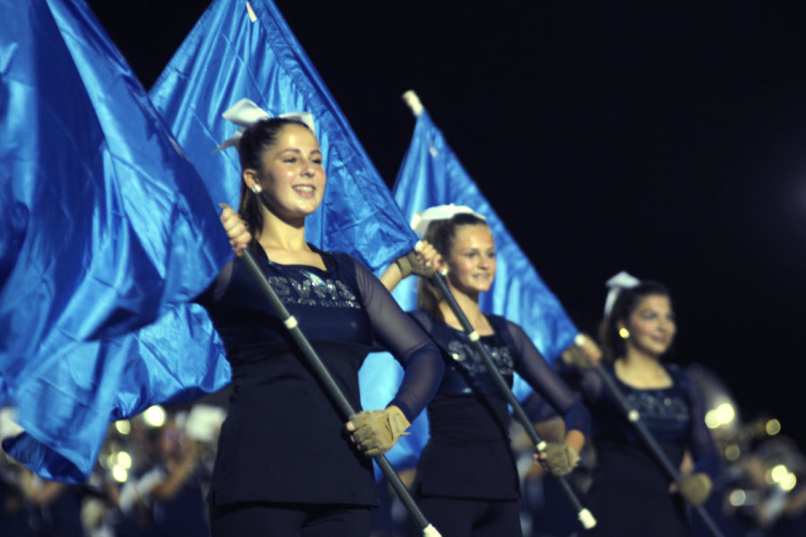 At+the+Judson+game+Oct.+29%2C+sophomore+Keely+Graber%2C+freshman+Ryan+Thomas+and+junior+Kaylean+Cook+perform+Xperiment+78070%2C+the+UIL+marching+show.+The+band+performs+at+the+area+contest+Saturday+at+3%3A30+p.m.