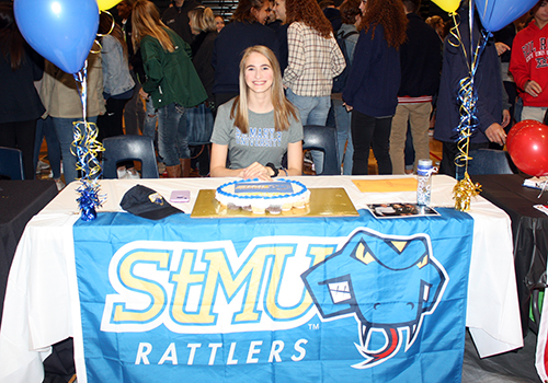 Tara McLeod signed her commitment to play volleyball at St. Marys University.