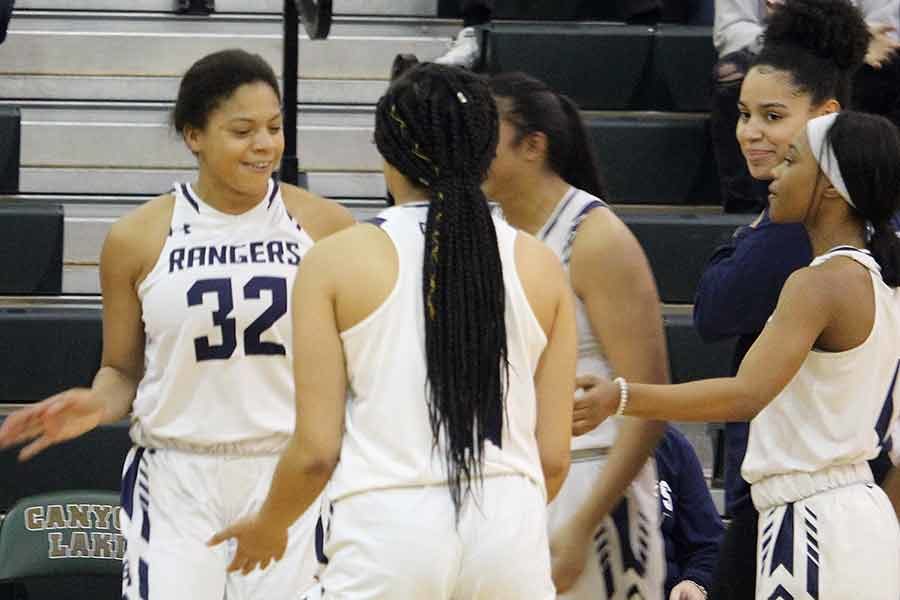 Junior Brianna Grells teammates hype her up as shes introduced in the starting lineup. Teammate Tanyse Moehrig was sidelined from a knee injury on Jan. 8 against Judson.

