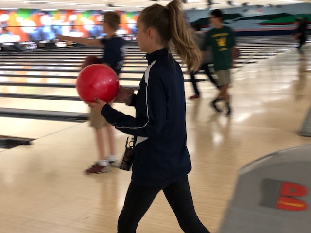 During a bowling trip Friday to New Braunfels, sophomore Tess Oliver approaches the lane to pick up a spare.