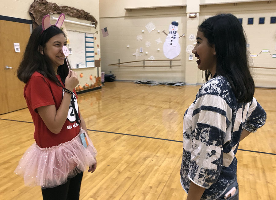 For Meme Day, freshman China Mercado celebrates Spirit Week with friends in the dance room.