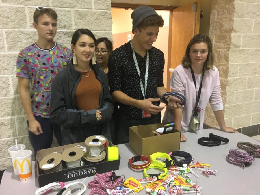 With their collection of dog collars, juniors Adrianna Krueger, Summer Williams, Hadley Thomas, Nathan Boyd and Dewitt Maxwell sell them to raise money to buy canine units for military and police personnel. The group calls itself Seans Canines.
