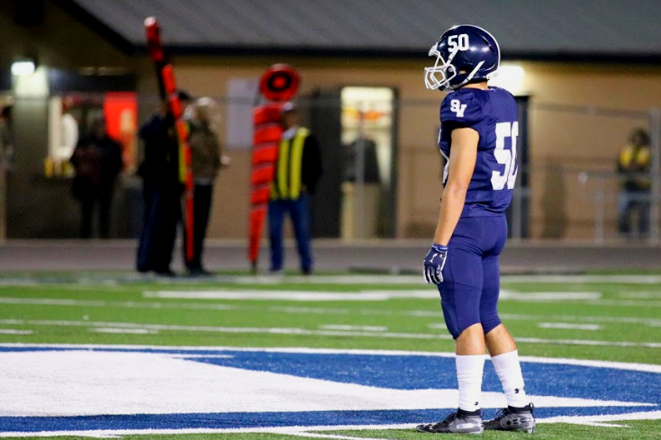 Carson Padilla stands alone at midfield during a game against East Central. Padilla was constantly in the Knights backfield Friday night, but it wasnt enough.