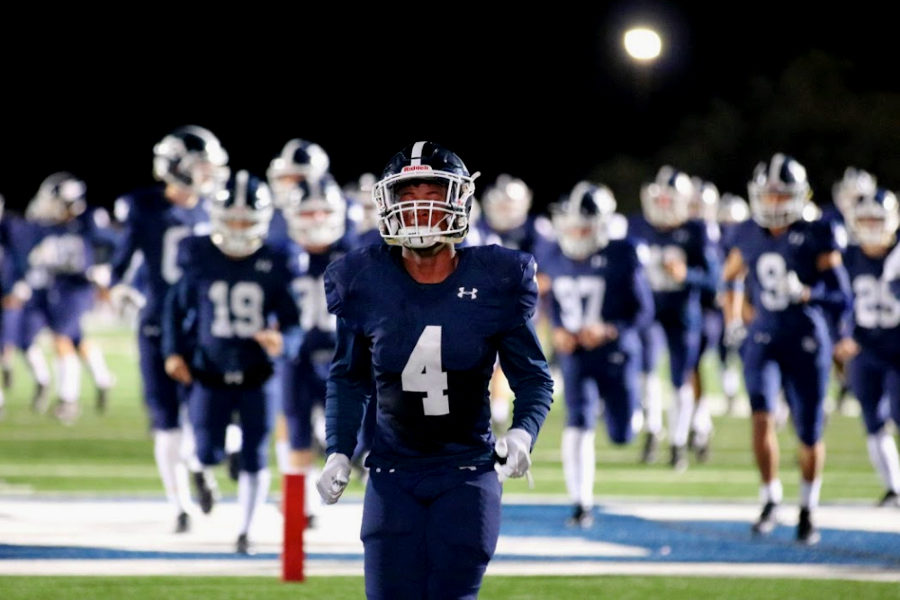 Jalen Nutt charges onto the field before a loss against Steele. Nutt and the Rangers hope to bounce back this week at San Marcos.