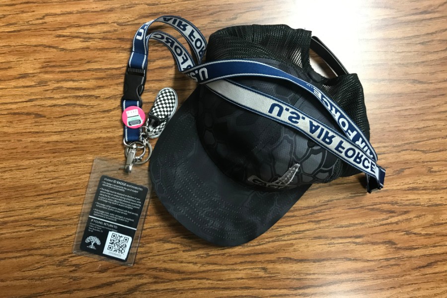 Students are required by school policy to wear IDs around their neck on campus.