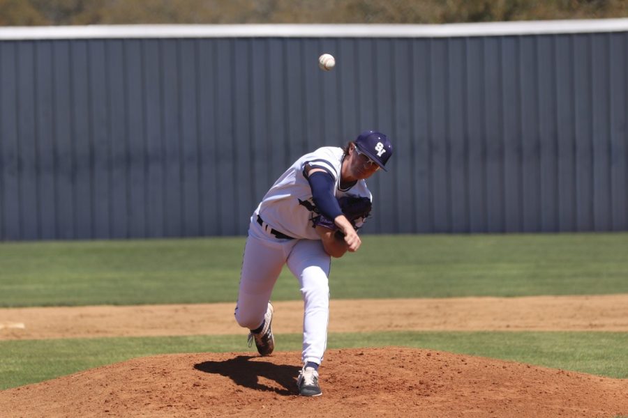 Shea Walker hurls a pitch against Fort Bend Clements. Walker pitched six innings, allowing two runs and striking out four.