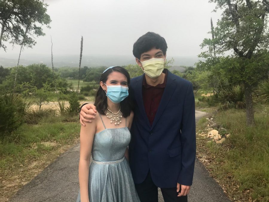 Skylar and Logan Hoover finish off their prom looks with their face masks, now required in San Antonio.