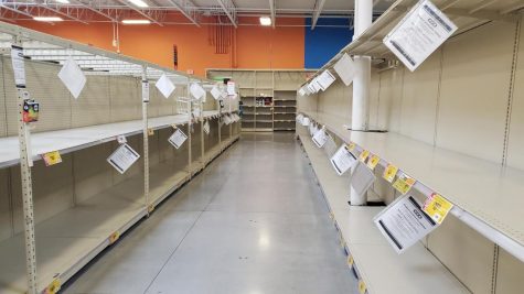 The paper goods aisle at H-E-B stands empty, much as it has since the middle of March.