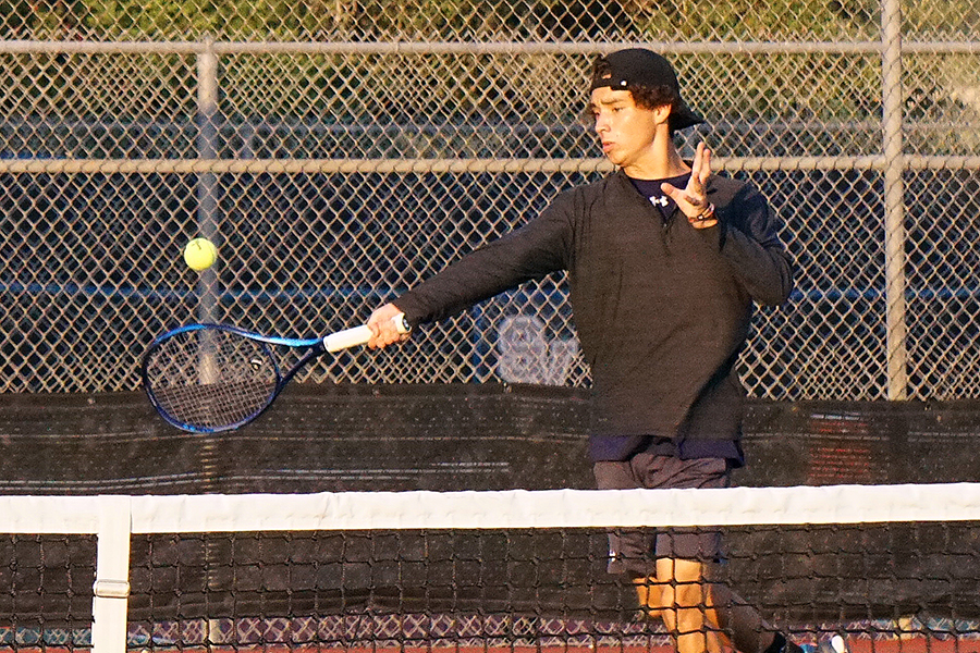 Senior Hayden Rios holds his ground on the court against East Central.