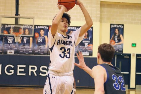 Zayden High pulls up for a jump shot. High, a sophomore, has averaged 15.6 points per game this season.