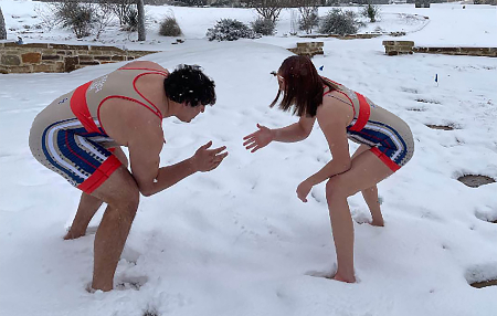 Siblings Ryan and Sage Benca square off in the snow. Both compete for the schools wrestling team. 