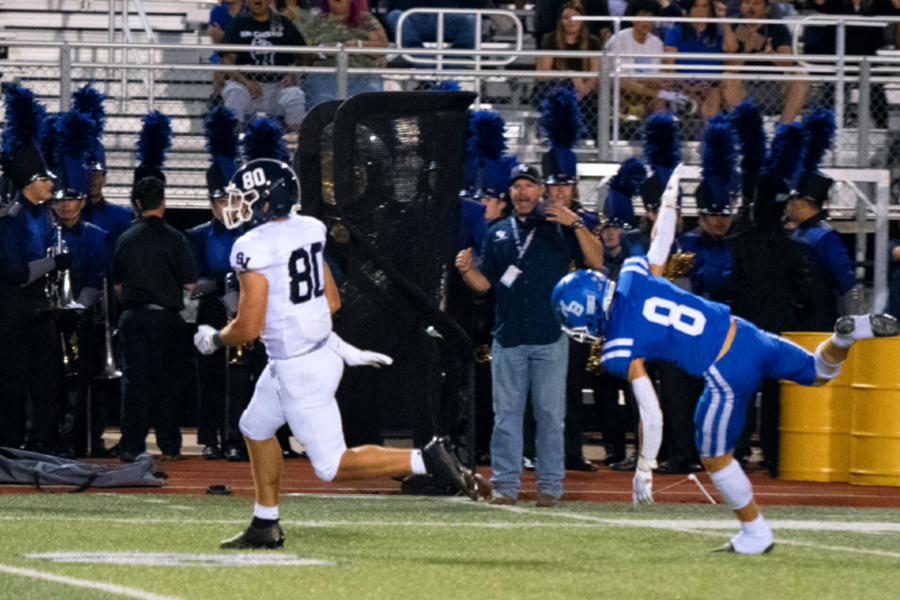 Behind+the+defense%2C+Dylan+Domel+runs+for+a+57-yard+gain+against+New+Braunfels+on+Sept.+23.+Domel+caught+three+passes+for+58+yards+and+two+touchdowns+on+Friday+against+Clemens.%0A%0A