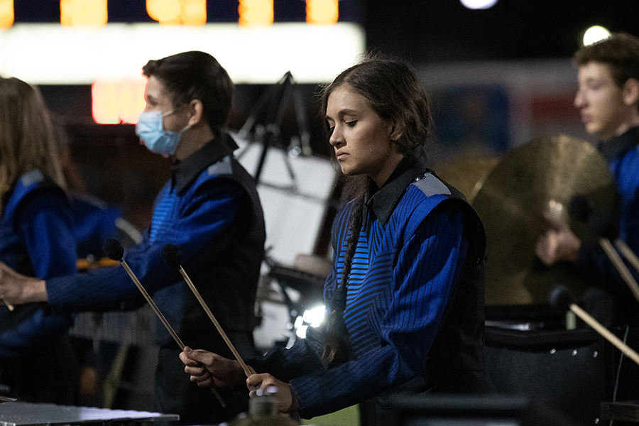 During halftime in the New Braunfels game Sept. 23, the drum line performs its competition show.