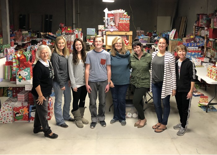 Each year, the Angel Tree team takes a group photo to memorialize their work that season.