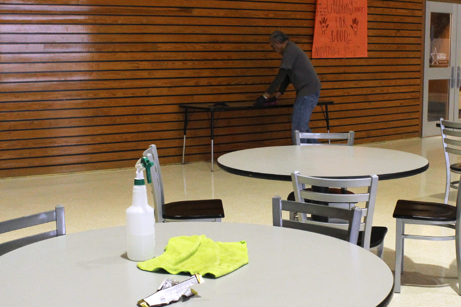A janitor cleans the senior dining hall left dirty by students Nov. 5