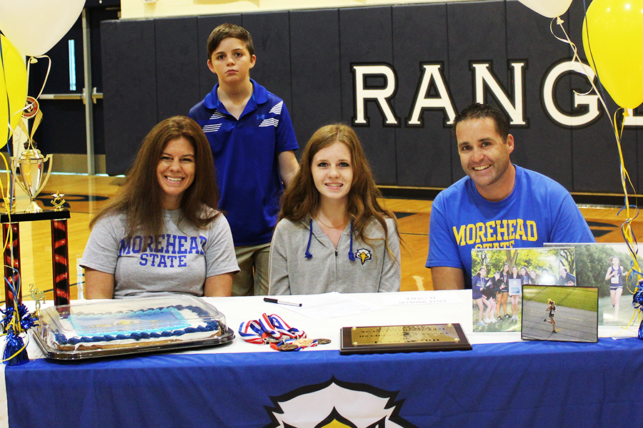 Julia Douglas signs to run track and cross country at Morehead State University. Douglas is a team captain.