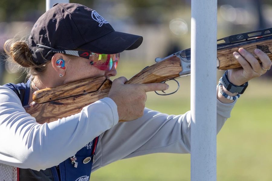 Senior Sidney Coffin represents Team USA as she competes in bunker trap shooting.