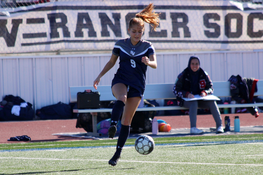 Sabrina Taber corrals a pass in a 10-0 win over MacArthur on Jan. 6. The UILs latest round of realignment placed the Rangers and Brahmas in the same Class 5A football district.