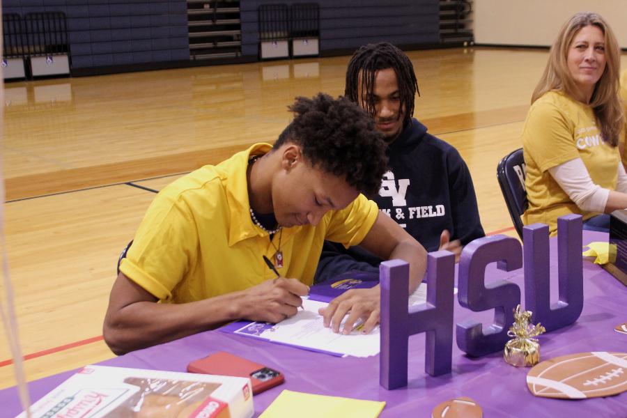 Garrison Eggleston puts his signature on  a letter of intent to play football at Hardin-Simmons University.