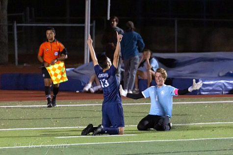 Matthew (Ice In His Veins) Capetillo celebrates with goalkeeper Cole Hansen after scoring the final penalty kick to seal the win against Westlake on March 29.