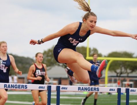Senior Zada Zimmerman jumps over a hurdle at last years Ranger Relays. Zimmerman set her personal record for the 100-meter hurdles at the Texas Relays last weekend.
