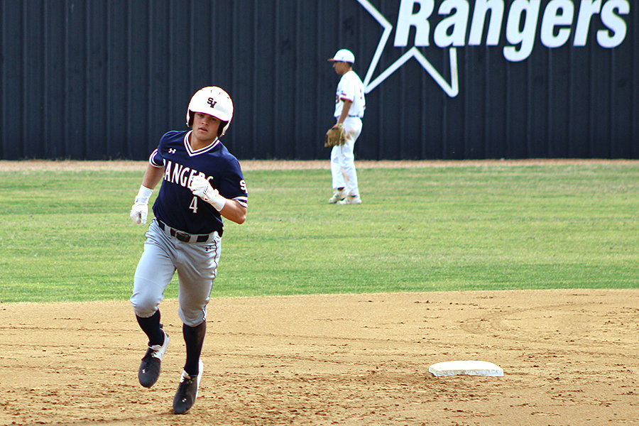 Senior Kasen Wells rounds the bases during tournament action on March 4.