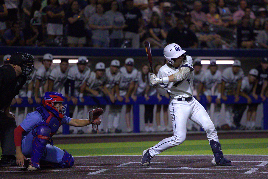 Swinging+for+the+fences%2C+Ethan+Gonzalez+knocks+a+home+run+over+the+left-center+field+fence+on+Friday+against+Austin+Westlake.+That+third-innings+home+run+tied+the+game+at+four-all%2C+and+helped+set+the+stage+for+the+dozen-inning+marathon+that+was+to+come.