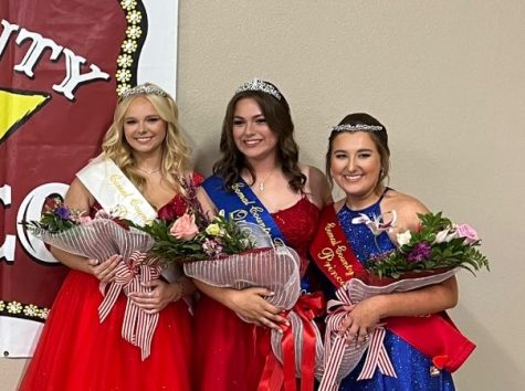 Comal County Fair Duchess Claire Schaeferkoeter celebrates with fair queen Peyton Wirebaugh and princess Jacy Welch.