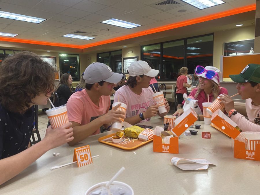 Dozens of students crowd the Spring Branch Whataburger after the Pink Out game.