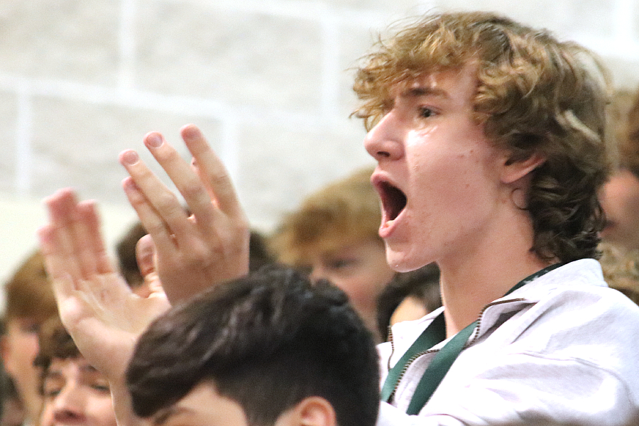 Sophomore Cody Crowe cheers on his school at last weeks homecoming pep rally.