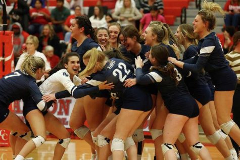 Volleyball cheers as they win Co-District Champs defeating Canyon 