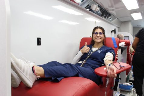 Elisa Bertini donating blood for the November 15th South Texas Blood Drive.